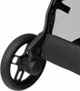 Close-up view of a stroller wheel and suspension system. Produktbild-Vorschau