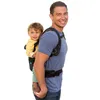 A man is carrying a baby on his back using a baby carrier. Anteprima dell’immagine prodotto