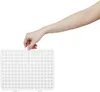 A hand is holding a white dehumidifier. Náhled obrázku produktu