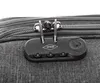 A close-up view of a luggage combination lock on a textured fabric suitcase. Náhled obrázku produktu