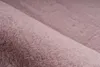A close-up view of a rolled-up piece of pink fabric. Produktbild-Vorschau