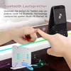 A close-up of hands interacting with a touch-sensitive surface, with a smartphone displaying music controls in the background. Náhled obrázku produktu