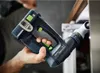 A person is holding a Festool power tool and using it to work on a cabinet or drawer. Produktbild-Vorschau
