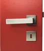 A close-up shot of a red door with a silver door handle and keyhole. Produktbild-Vorschau