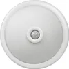 A close-up, top-down view of a white ceiling light fixture with a motion sensor in the center. Náhled obrázku produktu