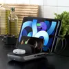 A Satechi charging station with a tablet, smartphone, and earbuds on a kitchen counter. Anteprima dell’immagine prodotto