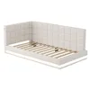 A white upholstered bed frame with a slatted base and integrated LED lighting. Produktbild-Vorschau