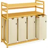 A bamboo laundry sorter with four fabric bins and two shelves. Anteprima dell’immagine prodotto