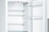 The interior of an empty white refrigerator with shelves and door compartments. Produktbild-Vorschau