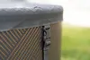 Close-up of a hot tub cover strap and the side of the hot tub. Náhled obrázku produktu