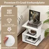 A white three-tiered side table with books and a mug on it, placed next to a sofa. Text overlays describe product features. Podgląd zdjęcia produktu