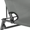 A close-up view of the joint and fabric of a gray lounge chair. Voir les images du produit