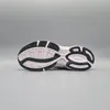 The sole of a white and black ASICS sneaker is shown against a plain gray background. Produktbild-Vorschau