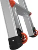 A close-up view of the bottom section of a multi-purpose ladder, focusing on the wheels and feet. Podgląd zdjęcia produktu