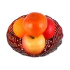 A fruit basket with an orange, a persimmon, a red fruit, and an apple. Produktbild-Vorschau