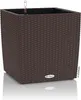 A brown woven planter with a water level indicator inside. Produktbild-Vorschau
