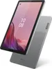 A Lenovo tablet is shown at an angle against a white background. The screen displays the time and a colorful wallpaper. Podgląd zdjęcia produktu