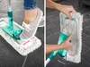 A collage showing a person using a mop and then detaching the mop head. Produktbild-Vorschau