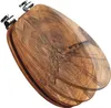A close-up, angled view of a wooden toilet seat with metal hinges, presented against a white background. Podgląd zdjęcia produktu