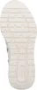The image shows the sole of a white shoe. Voir les images du produit