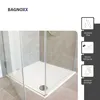 A close-up view of a modern shower enclosure with a white base and tiled walls. Produktbild-Vorschau
