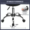 Close-up of the base of a black stool, highlighting its chrome-plated five-star base with wheels and a gas lift mechanism. Produktbild-Vorschau