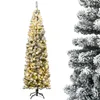 A tall, slender artificial Christmas tree with snow-like flocking and warm white LED lights, standing on a black metal stand against a white background. A close-up of the tree's branches is visible on the right side. Produktbild-Vorschau