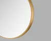 A close-up of a round mirror with a gold frame. Náhled obrázku produktu