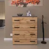 A modern chest of drawers with a wood grain finish and gray top, placed in a room with artwork on the wall and an umbrella stand next to it. Produktbild-Vorschau