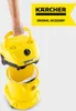 A hand holding the top part of a yellow Karcher vacuum cleaner over its base. Náhled obrázku produktu