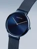 A close-up studio shot of a blue Bering watch with a mesh band. Podgląd zdjęcia produktu
