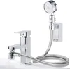 A chrome faucet with a detachable shower head and hose attached. Produktbild-Vorschau