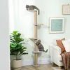 Two cats are playing on a multi-level cat tree in a living room setting. Náhled obrázku produktu