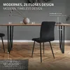 A dining table with black chairs in a room with a wooden floor. Náhled obrázku produktu