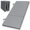 A folded and unfolded gray mattress on a white background. Produktbild-Vorschau