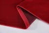 A close-up view of red velvet fabric, showing the texture and a folded edge. Produktbild-Vorschau