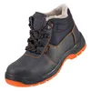 A single black winter work boot with orange accents is shown against a white background. Produktbild-Vorschau