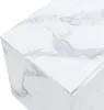 A close-up view of the corner of a white nightstand with a marble-like pattern. Anteprima dell’immagine prodotto