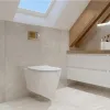 A modern bathroom with a wall-mounted toilet and vanity. Produktbild-Vorschau