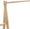 A close-up of a wooden clothing rack. Náhled obrázku produktu