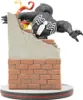 A Venom Q-Fig diorama figurine climbing over a brick wall. Produktbild-Vorschau