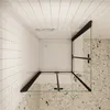 A top-down view of a shower cabin with a white shower tray and glass doors. Produktbild-Vorschau