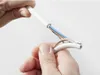 Hands are shown stripping the outer casing of a white electrical cable to expose the inner wires. Produktbild-Vorschau