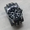 A black and silver Invicta Pro Diver SCUBA watch is displayed on a dark gray stand against a light gray wooden background. Náhled obrázku produktu