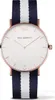 A close-up, studio shot of a PAUL HEWITT watch with a navy and white striped fabric strap. Produktbild-Vorschau