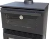 A close-up view of a black wood-burning stove with a glass oven door and a thermometer. Produktbild-Vorschau