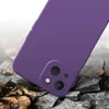 A purple phone case is shown on a cracked, rocky surface, suggesting durability. Produktbild-Vorschau