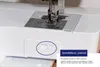 Close-up of a sewing machine with a highlighted switch and a text box describing a feature. Produktbild-Vorschau