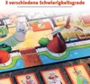 A board game with game pieces and cards laid out on a surface. Produktbild-Vorschau