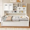 A white wooden daybed with a built-in shelving unit and cabinets above it. Náhled obrázku produktu